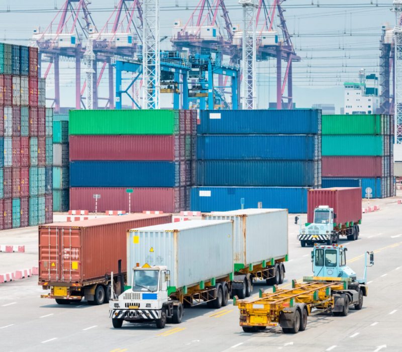 busy container terminal closeup, brisk trade and economic growth concept